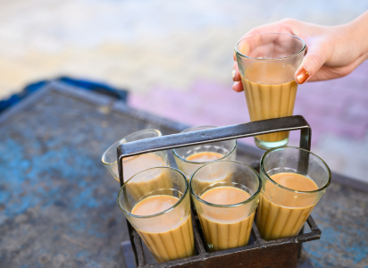 Pakistani chai being served in a glass